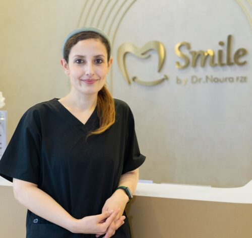 Dr Noura, a trusted kids dentist at Smile by Dr Noura, welcoming families to her kids dental clinic in Dubai.